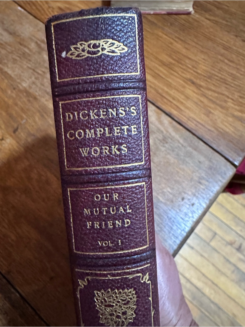 antique hardcover volume of Charles Dickens's Our Mutual Friend